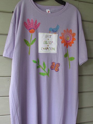 A purple sleepshirt with flowers on it.