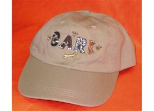 A tan hat with the word " bark " written on it.