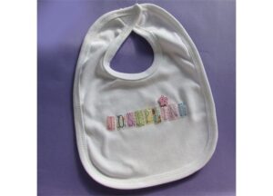A white bib with the word " hospital " written on it.