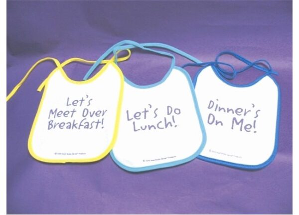 Yellow and blue bibs with printed sayings about meals