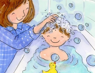 A child is bathed in the bath tub